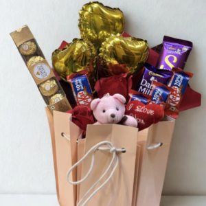 Pink Celebration Surprise – Teddy, Chocolate & Balloon Gift Hamper